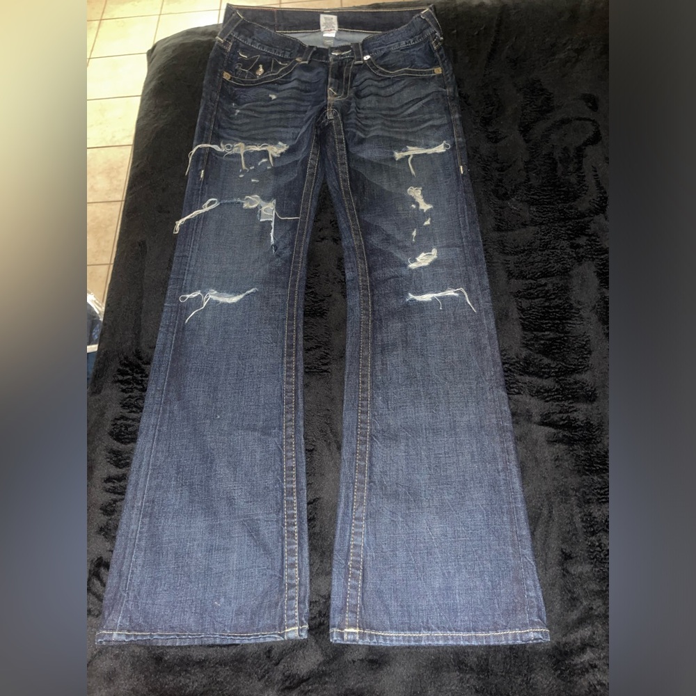 Distressed Blue Jeans